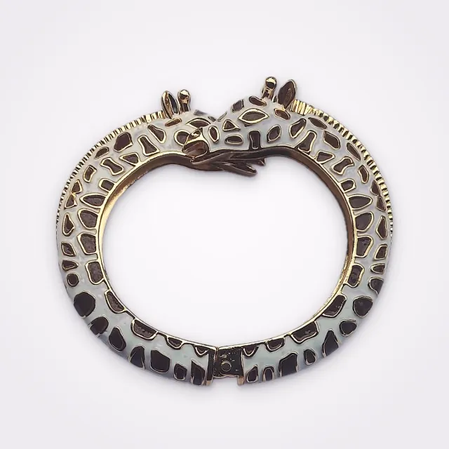 Gold Tone Double Headed Giraffe Statement Bangle In White And Brown Enamel