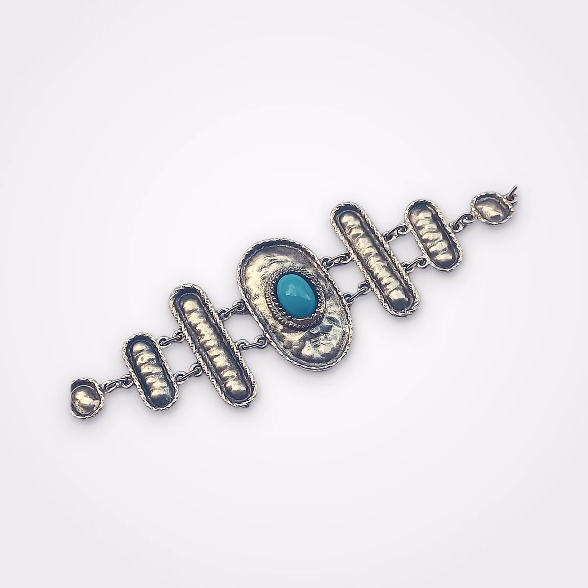 Silver Plated Tribal Bracelet With Geometrical Links And A Central Turquoise Stone