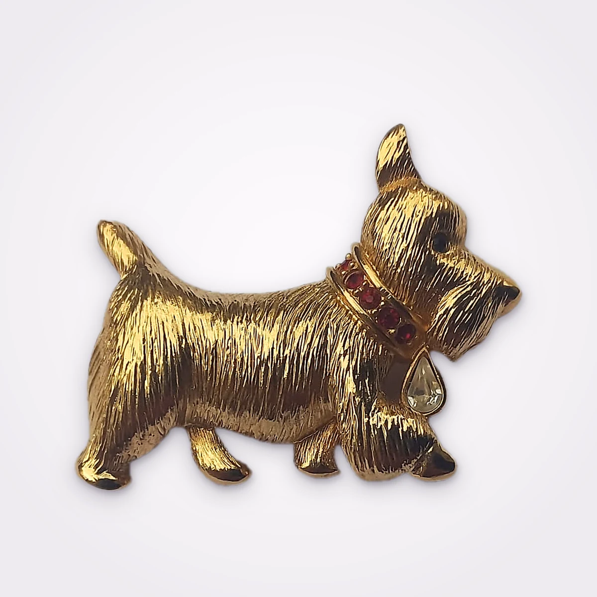 Vintage 80s Napier Scottie Dog Gold Tone Brooch Adorned With Black Rhinestone Eye, A Collar Studded In Red Rhinestones And A Dangling Clear Rhinestone Teardrop