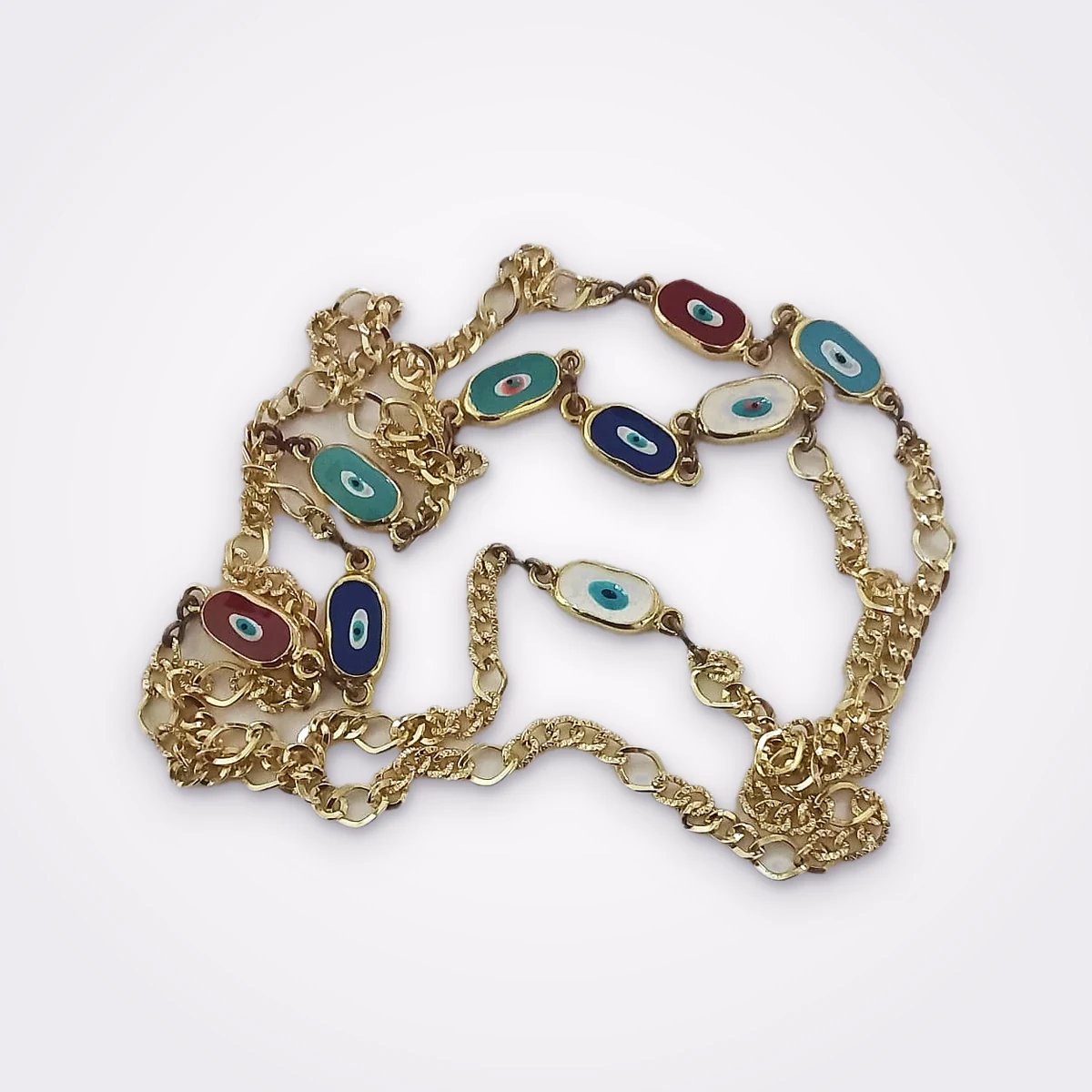 Gold Tone Sautoir With Chain Links And Multiple Evil Eye Links In Red, White, Dark Blue & Turquoise Enamel